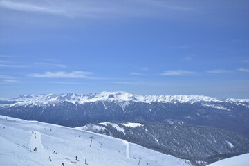 Fototapeta na wymiar Snow Mountain Landscape with Blue Sky from russia sochi, rosa khutor