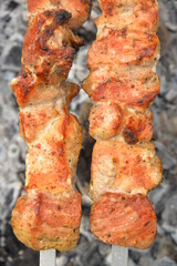 lamb kebab close up view. shashlik over charcoal