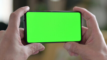Close up of Old Man Watching Smartphone with Chroma Screen