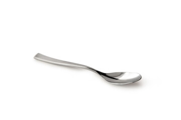 the metal shiny spoon on white background