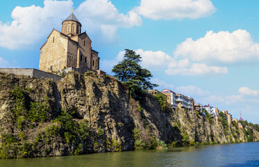 Fototapeta na wymiar Metekhi St. Virgin Church over Kura river, Tbilisi, Georgia
