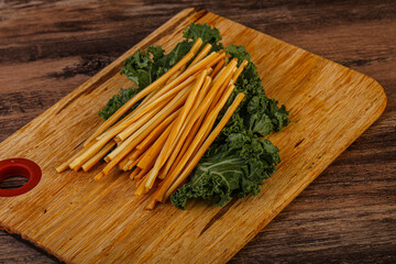 Chechel cheese sticks over board