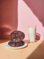Morning brownie cookies with glass of milk