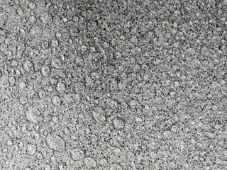 Droplet on Explsed or exposed aggregate finish surface floor.gray.