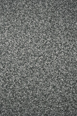 Vertical shot of Polished Black And White Granite Texture, Architecture Pattern