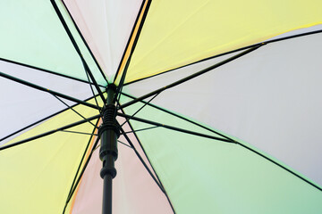 pastel color umbrella in under view