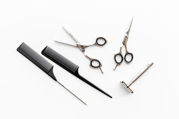 Barber tools with hairdressing scissors and combs