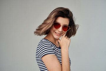 woman with fashionable hairstyle sunglasses posing fashion summer