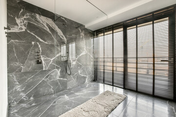 Marble bathroom with shower unit