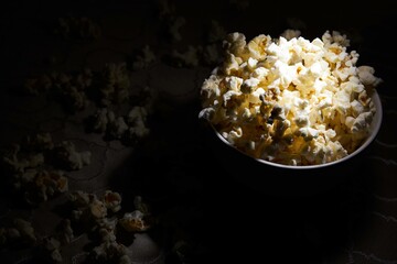 popcorn basket lit by a reflector