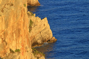 Rocks and sea at sunset