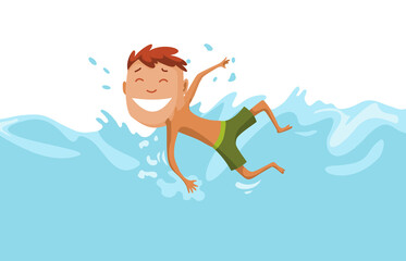 Fototapeta premium Children swimming in pool. Cheerful and active little boy swimming in pool. Boy in swimwear are swimming in a children pool. Underwater view