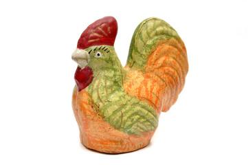 Colorful chicken piggy banks made of ceramic on a white background