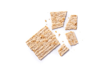 Traditional matzah bread broken isolated on white background