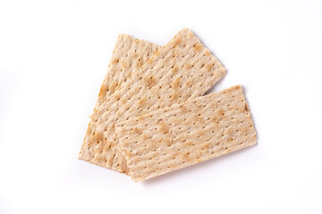 Traditional matzah bread isolated on white background. Top view. 