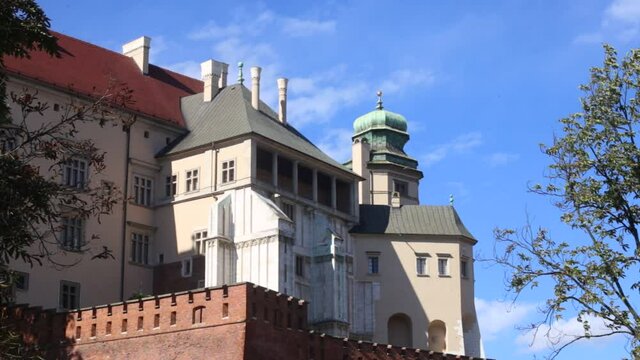 Cracow, Malopolska, Poland - 04.10.2020: Wawel, the royal castle. Kurza Stopa (Chickens Foot) tower and windows and balconies of royal private chamber
