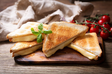 Grilled sandwiches with melted cheese