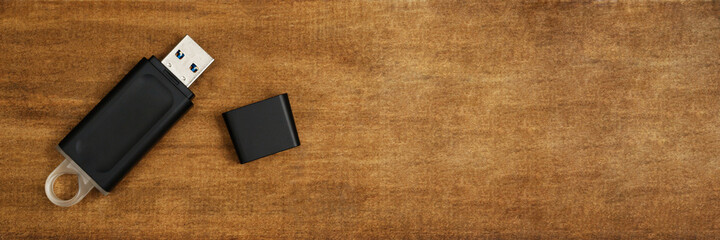 Flash drive for data storage placed on the desk