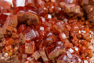 Macro mineral stone Vanadinite on a white background