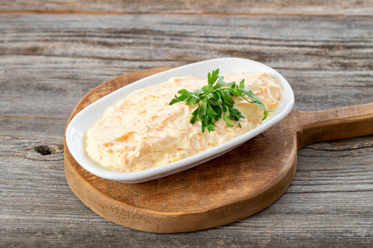 Carrot salad is prepared with grated carrots, garlic and yogurt. Traditional turkish cuisine