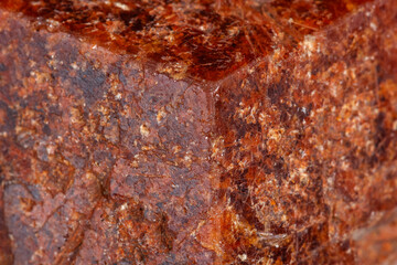Macro mineral stone Garnet on a white background