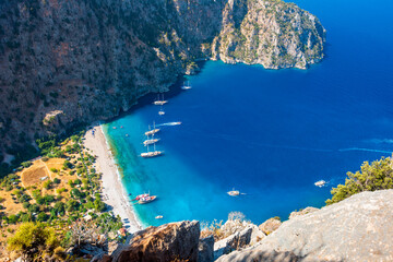 Butterfly Valley (Turkish: Kelebekler Vadisi) is a valley in Fethiye district, Mugla Province, on the Mediterranean coast of Turkey. Oludeniz - Fethiye, Mugla, Turkey. © resul