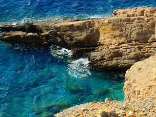 clear turquoise water in Aegean Archipelago taken from 100 m above sea level in the island of kato koufonisi August 20th 2021