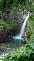 france Waterfall with long exposure and blurred water flow in Ecrins national park
