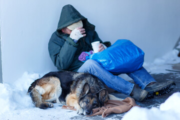 male homeless and his dog
