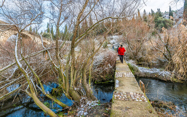 Woman Bridge at snowy day in Manisa