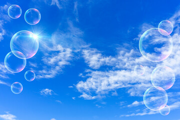 太陽の日差しと青空と雲とバブルの背景素材_c_11