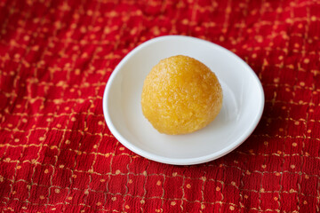 Motichoor Ladoo Rava Laddu, Kesar laddu Semolina Indian sweet dish mithai Diwali Dussehra Holi Ram Navmi Ganesh chaturthi Durga Pooja festival dessert snack golden plate Kerala Mumbai India Sri Lanka