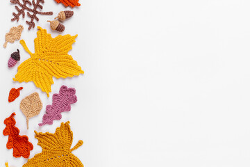 Background with knitting yellow leaves. Autumn concept. Fall mood
