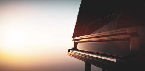 Grand piano keyboard on sunset sky