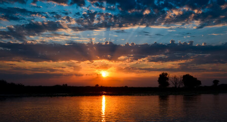 sunrise over the river in summer from the clouds