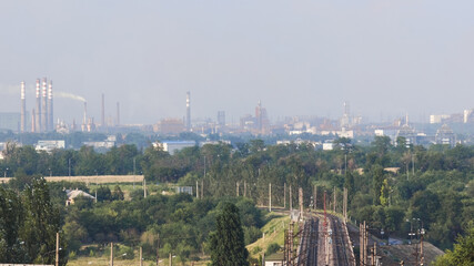 View of the industrial city of Zaporozhye, Ukraine. Smog emissions, air pollution. Bad...