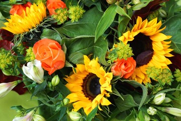 Colorful floral bouquet with sunflowers and roses