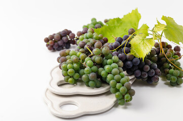 grape green and blue bunches on white background
