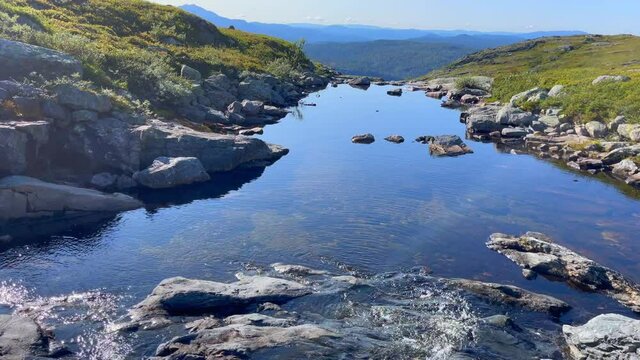 Videos of norwegian watercourses down the mountain and waterfalls