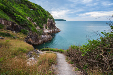 Beautiful landscape view with endless horizon and stairway to the sea on Pha Suk Nirun cliff at chathaburi city thailand.Pha Suk Nirun cliff A popular sunrise and sunset location in chathaburi city.