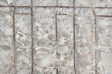 Concrete texture. Concrete wall with rusty reinforcement rods background.Texture of old gray concrete wall for background.Grey grunge textured wall.