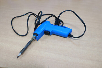 An electric soldering iron is a soldering iron that uses electric power to generate heat to connect objects