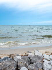 Seascape view with sunlight under cloudy sky