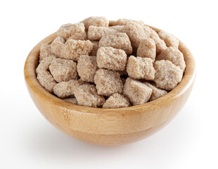Cubes of brow cane sugar in wooden bowl isolated on white background with clipping path