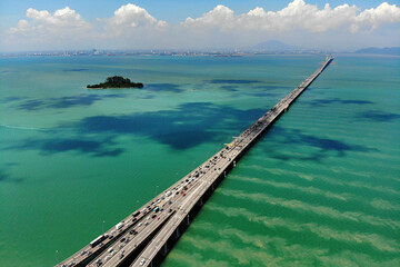 Penang Bridge from an aerial perspective. A 13.5KM length dual carriageway bridge in the state of Penang, Malaysia. - obrazy, fototapety, plakaty