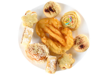 Break the fast for Yom Kippur with mini diverse cookies isolated on white. Arabic Sweets. Middle Eastern Desserts. Festive Henna Cookies. Moroccan Sweets. Mimouna Cookies.