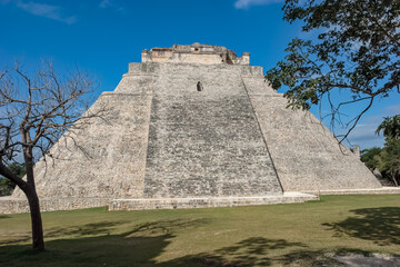 Fototapeta na wymiar Pyramid of the Dwarf also known as the Pryamid of the Magician in the city of Uxmal, Mexico