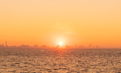 Naklejka premium the sun in the sea