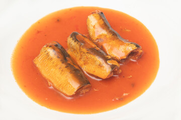 Sardine in tomato sauce on isolated white background.