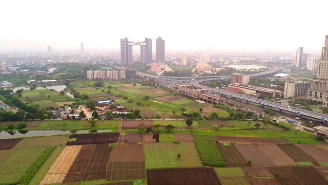 KOLKATA, INDIA :-Bird eye view of kolkata city with ITC hotel,atmosphere building and maa fly over at New Town on the main arterial road. 4k,aerial,drone,kolkata city,conceptual shot.